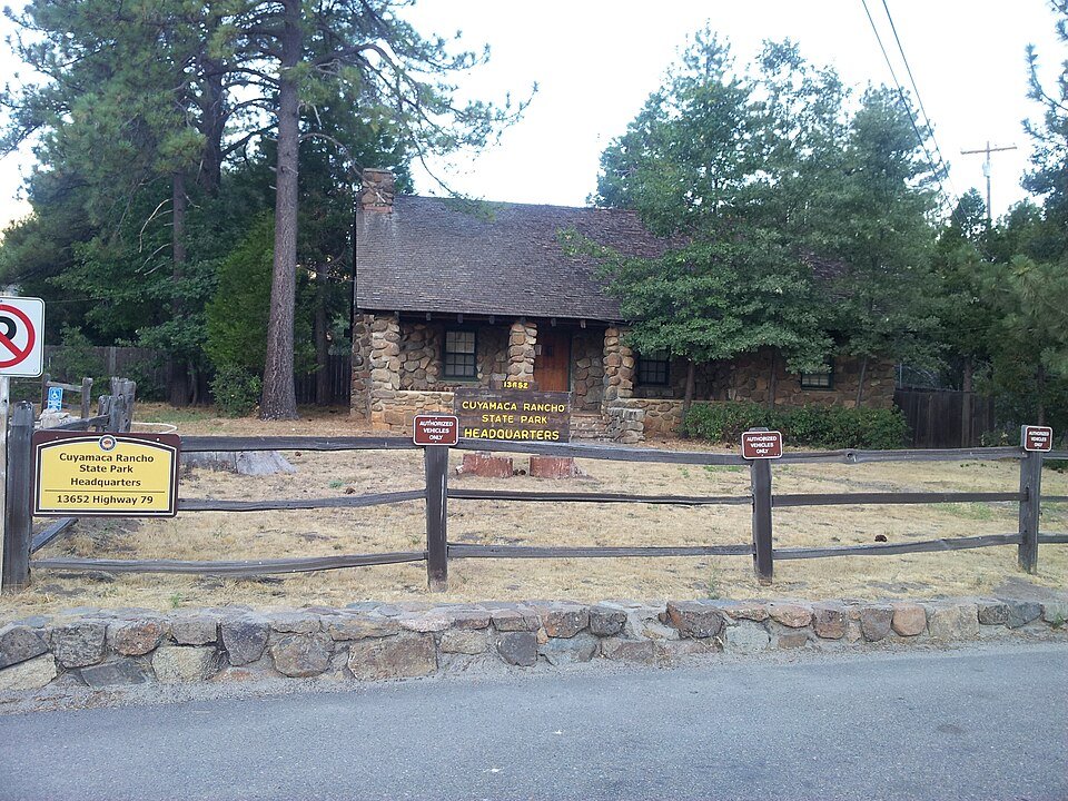The stone headquarters building and entrance sign of Cuyamaca Rancho State Park