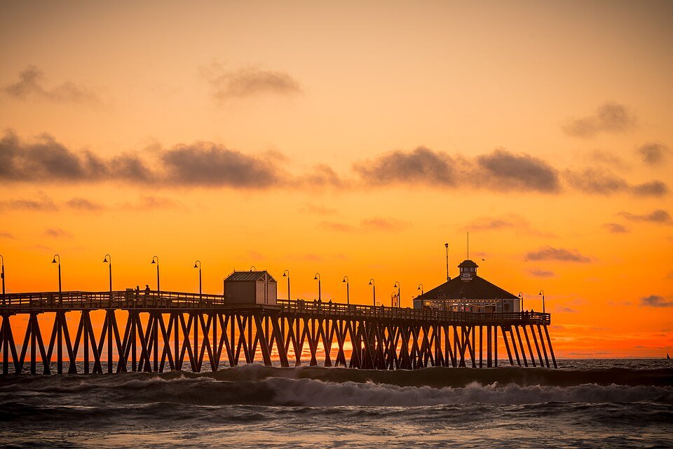 Imperial Beach Pier at sunset with an orange sky