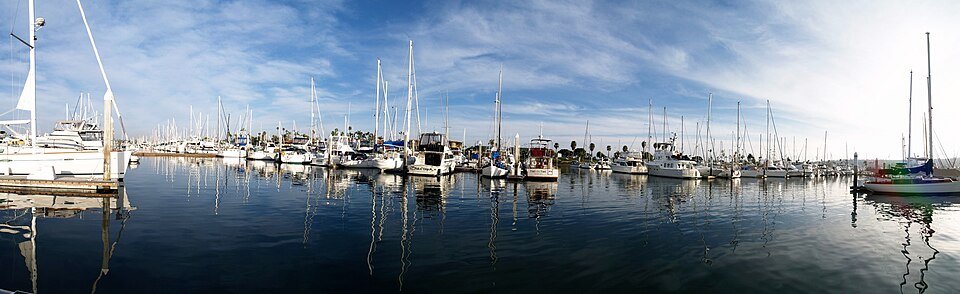 Sailboats and yachts moored in the Shelter Island marina on San Diego Bay